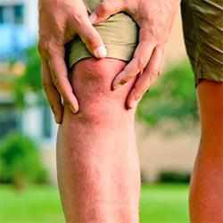 A man suffering from joint pain uses deer antler velvet to alleviate pain and improve joint health and flexibility.