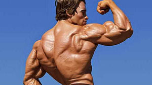Man flexing his muscles after taking deer antler velvet to increase testosterone levels