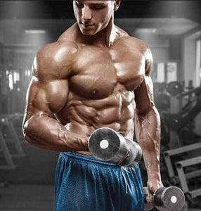 Man lifting weights after taking deer antler velvet to improve his muscle strength and athletic performance